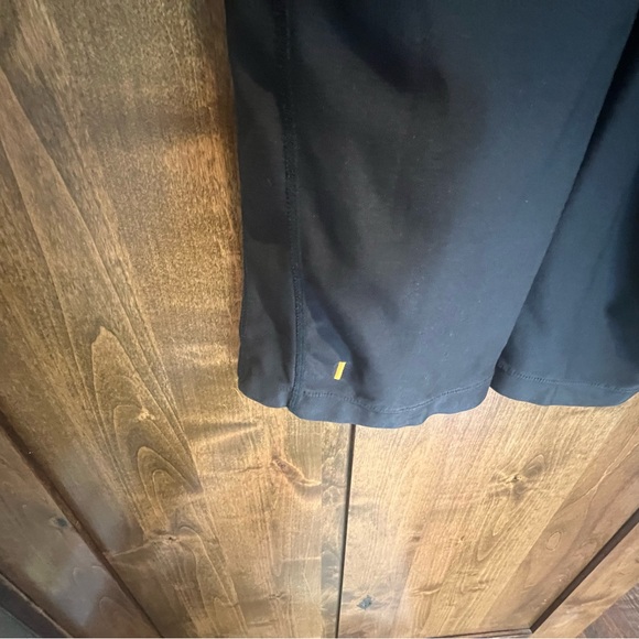 Woman's Lucy Activewear, black, flare pants. Size small. Elastic waist /pocket. - Picture 5 of 7